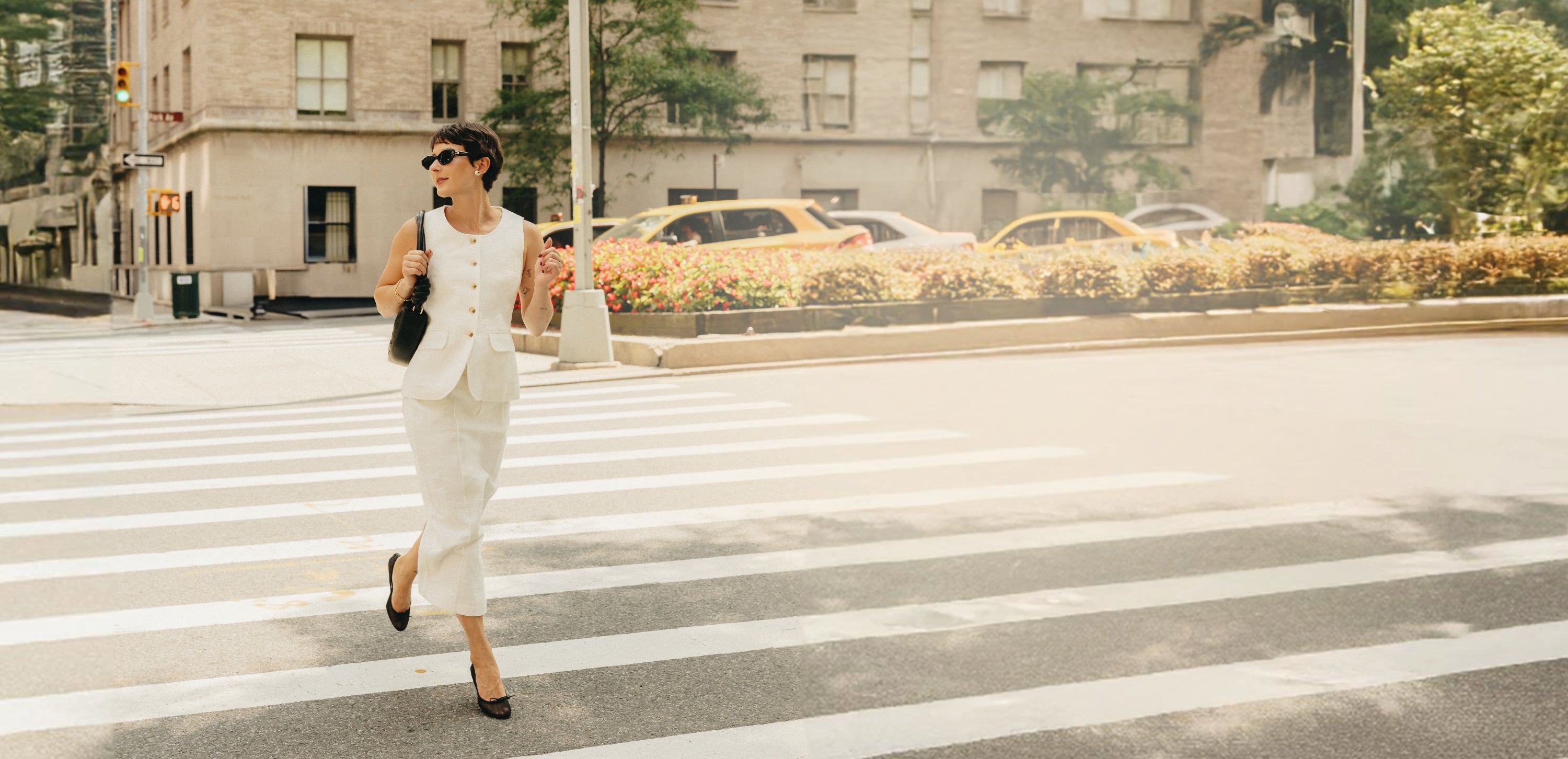 Influencer walking on 5th Avenue wearing Petite Studio's Business Casual collection